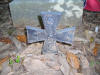 Iron Southern Cross of Honor marker on a Confederate grave