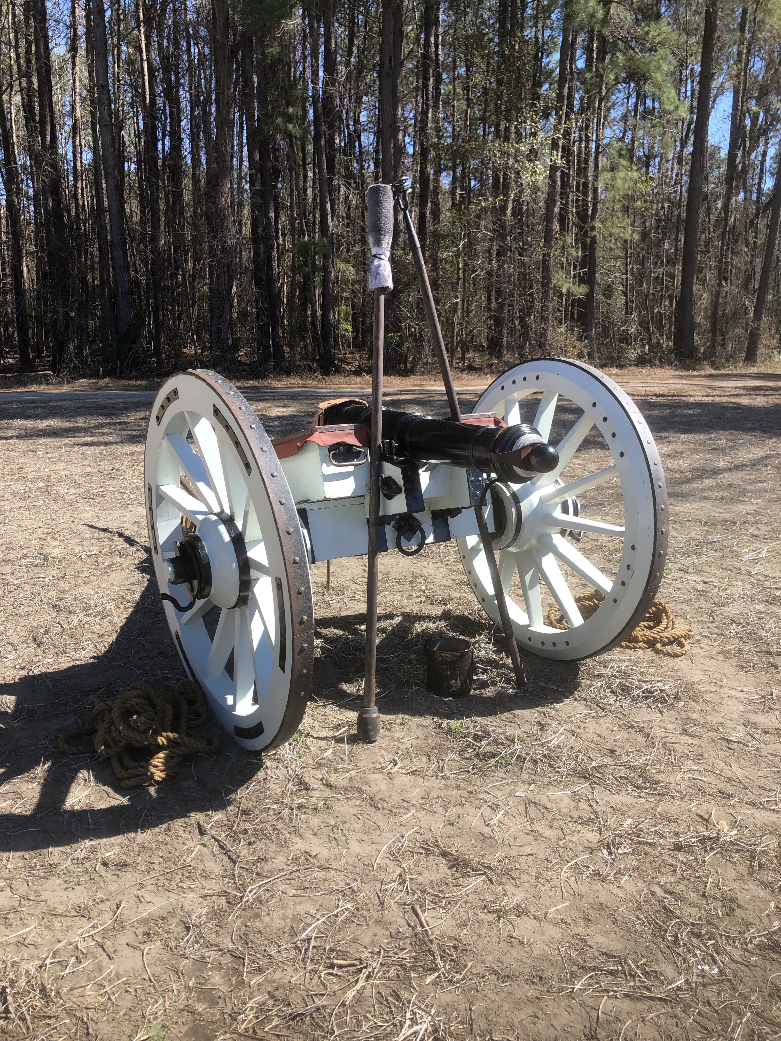 Gray field cannon with large spoked wheels