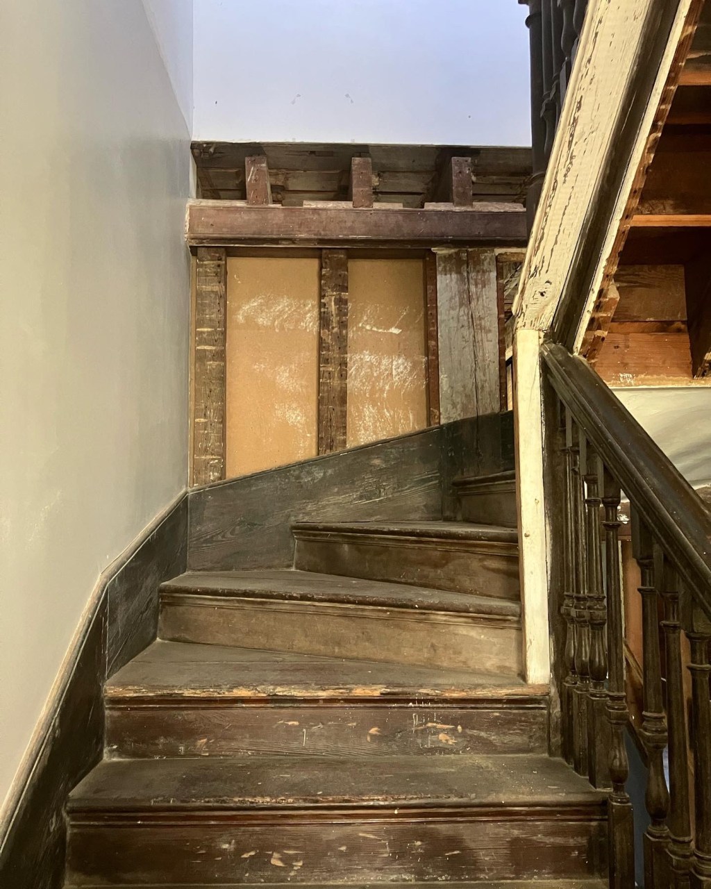 Winding wooden back staircase in the Hampton house