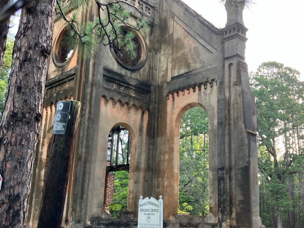 Corner of the chapel ruins among the pines