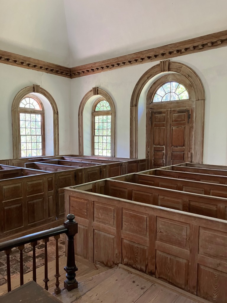 Box pews and a turned stair rail