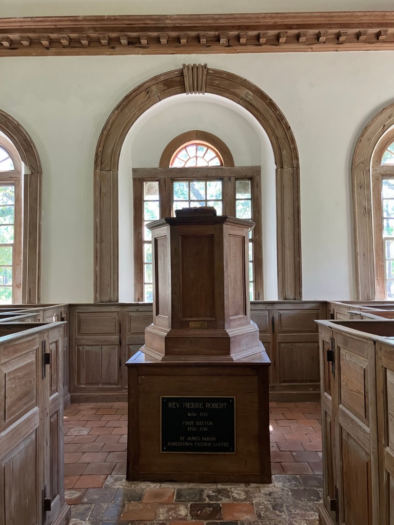 The wooden pulpit at the end of the aisle