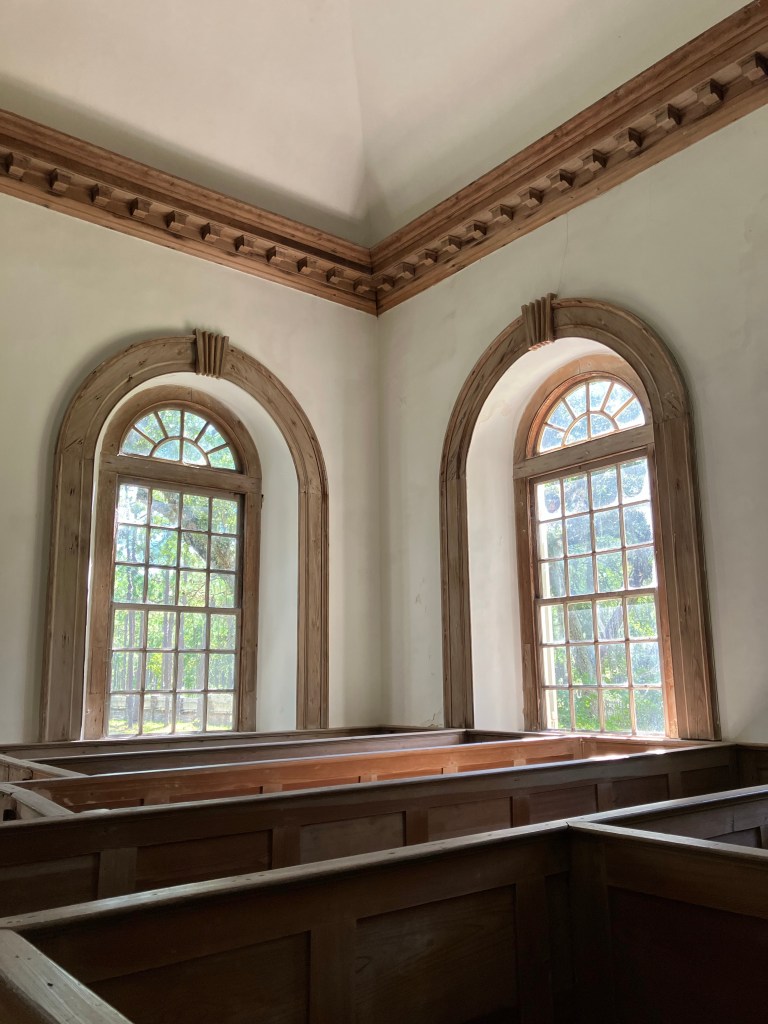 Arched windows in a corner of the nave