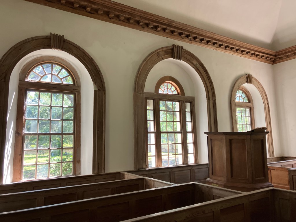Arched windows and the pulpit