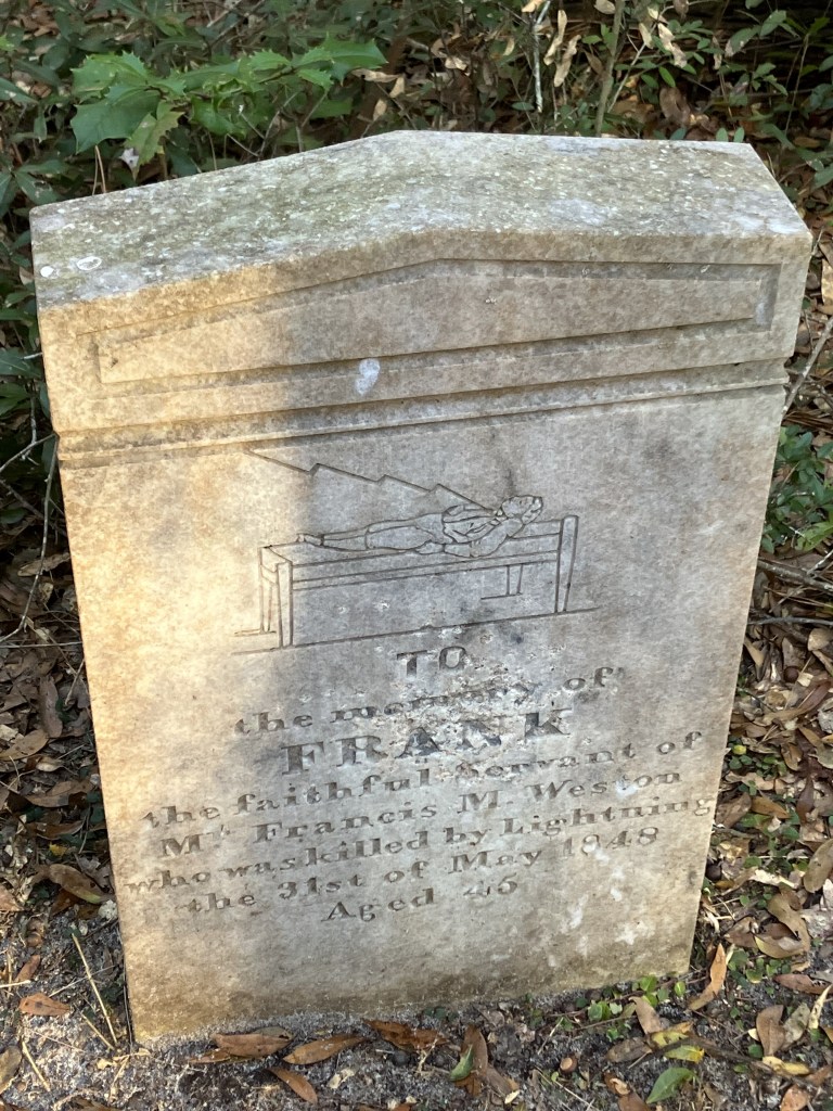 Front view of Frank's carved marble headstone
