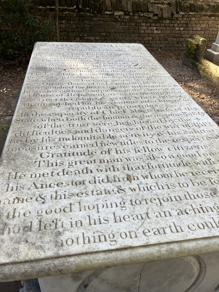 Close view of the long inscription on the marble tomb of Joseph Alston in the Alston cemetery