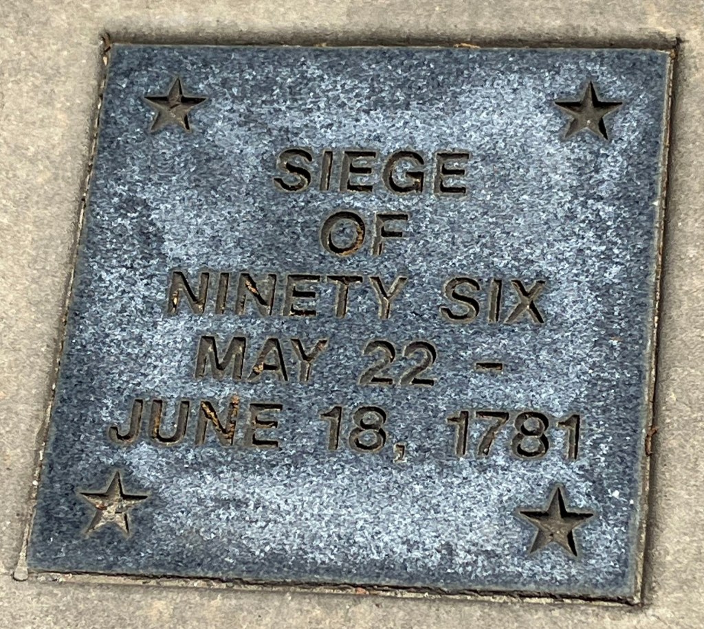 Engraved stone tile reading Siege of Ninety Six, May 22 – June 18, 1781