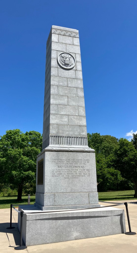 The tall granite 1932 monument at Cowpens National Battlefield