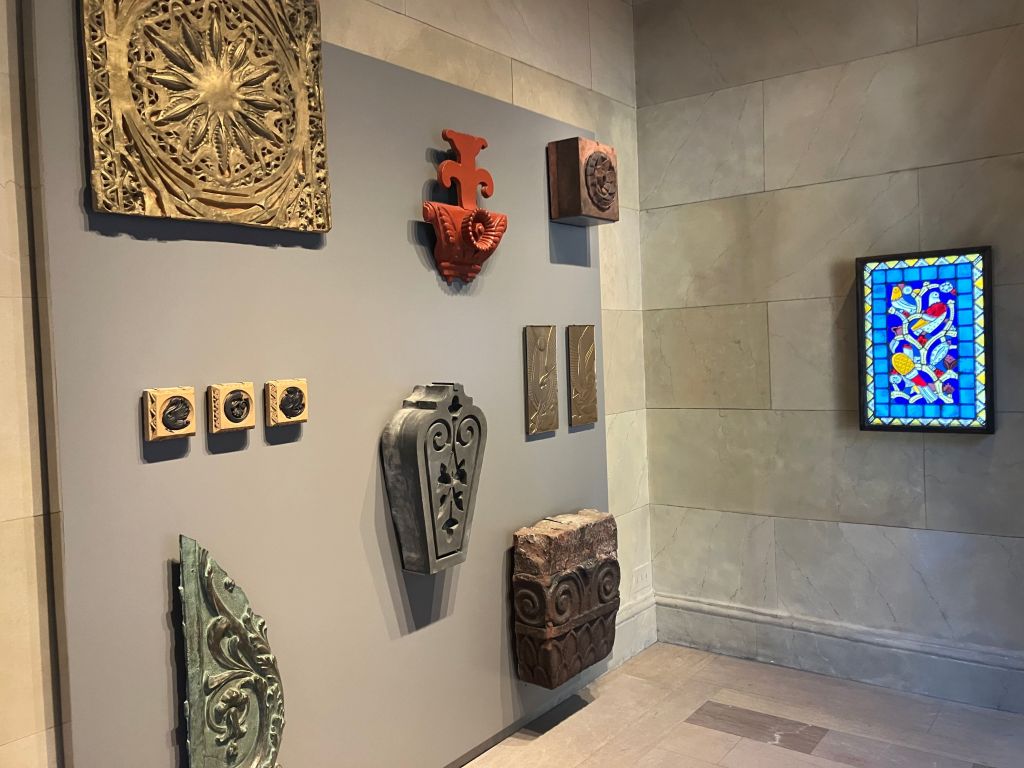 Gallery wall of architectural ornaments and fragments