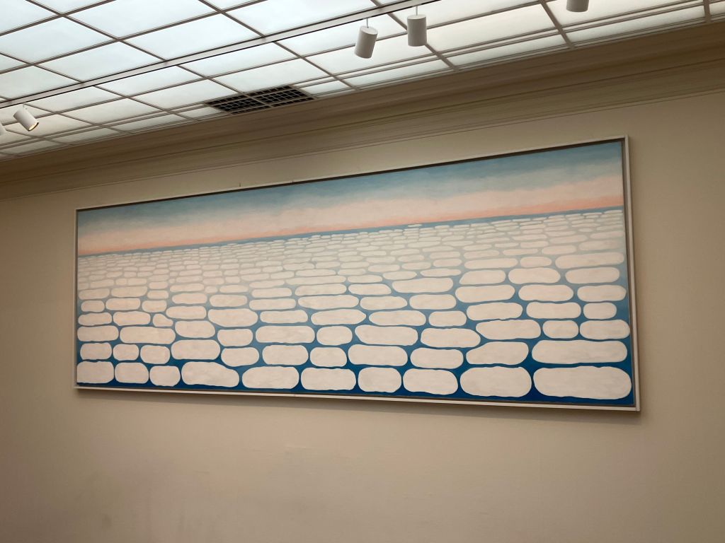 Georgia O'Keeffe's huge painting Sky Above Clouds IV on a gallery wall at the Art Institute of Chicago