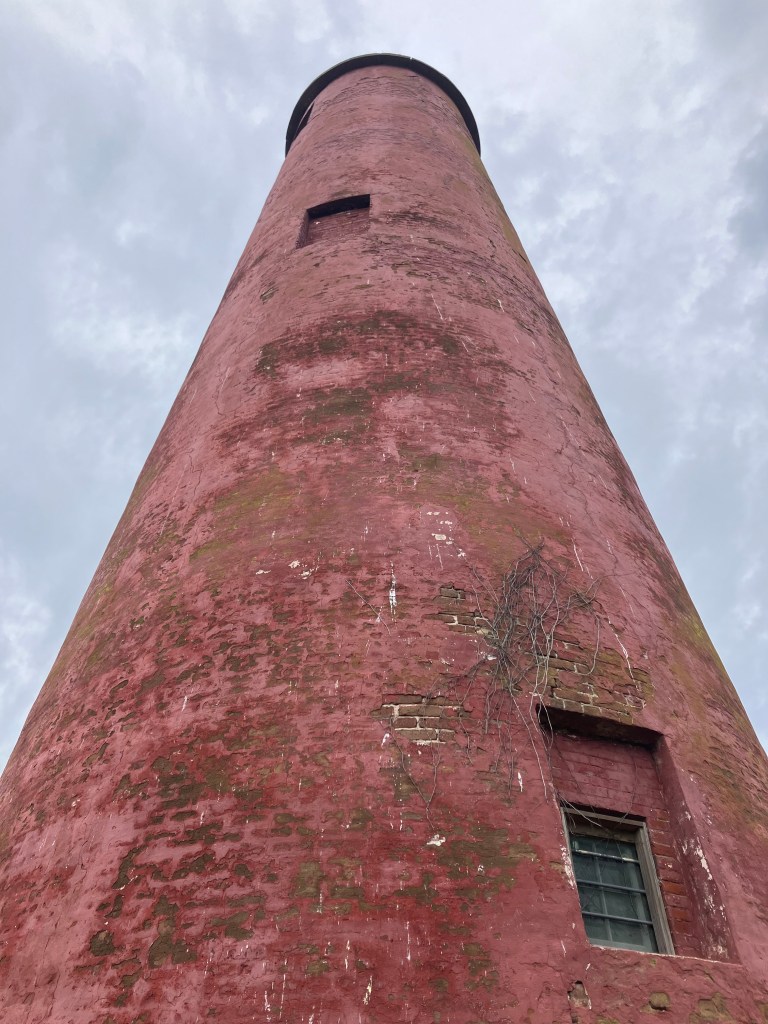Looking up the 1827 lighthouse at its small windows