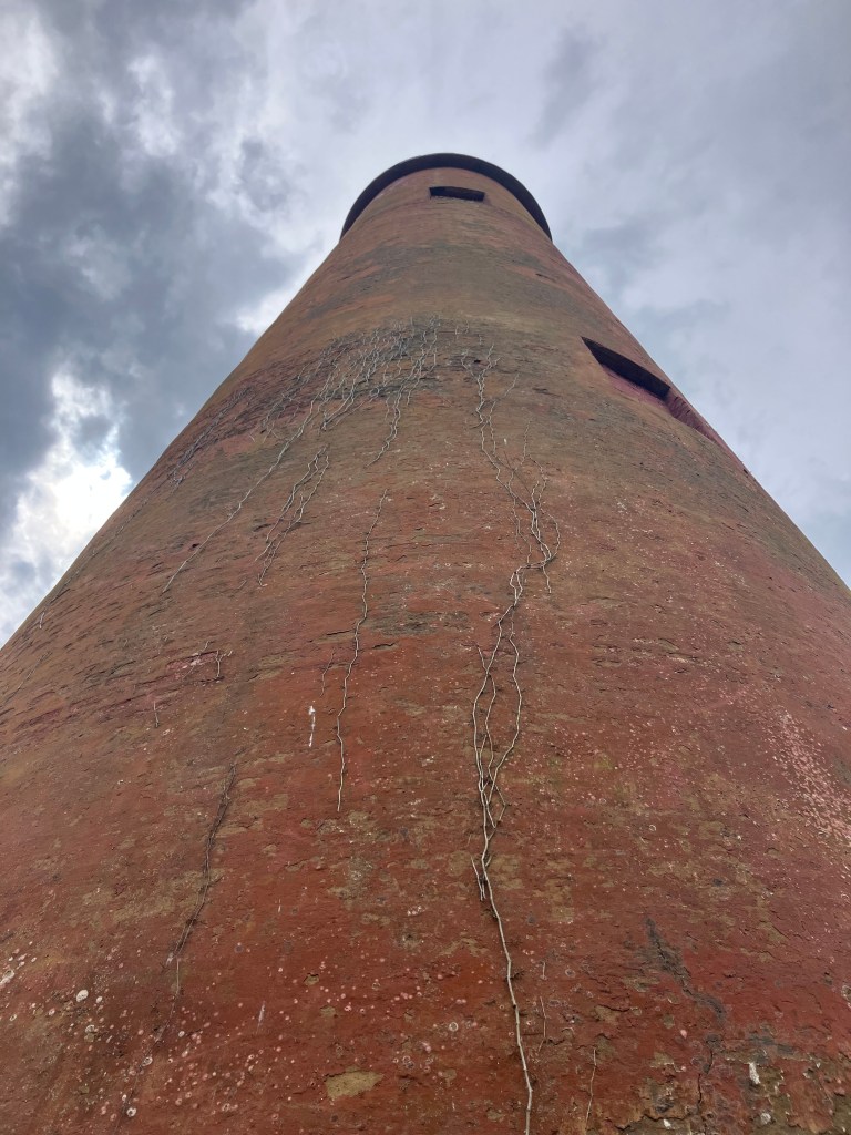 Looking up the red brick 1827 Cape Romain Lighthouse