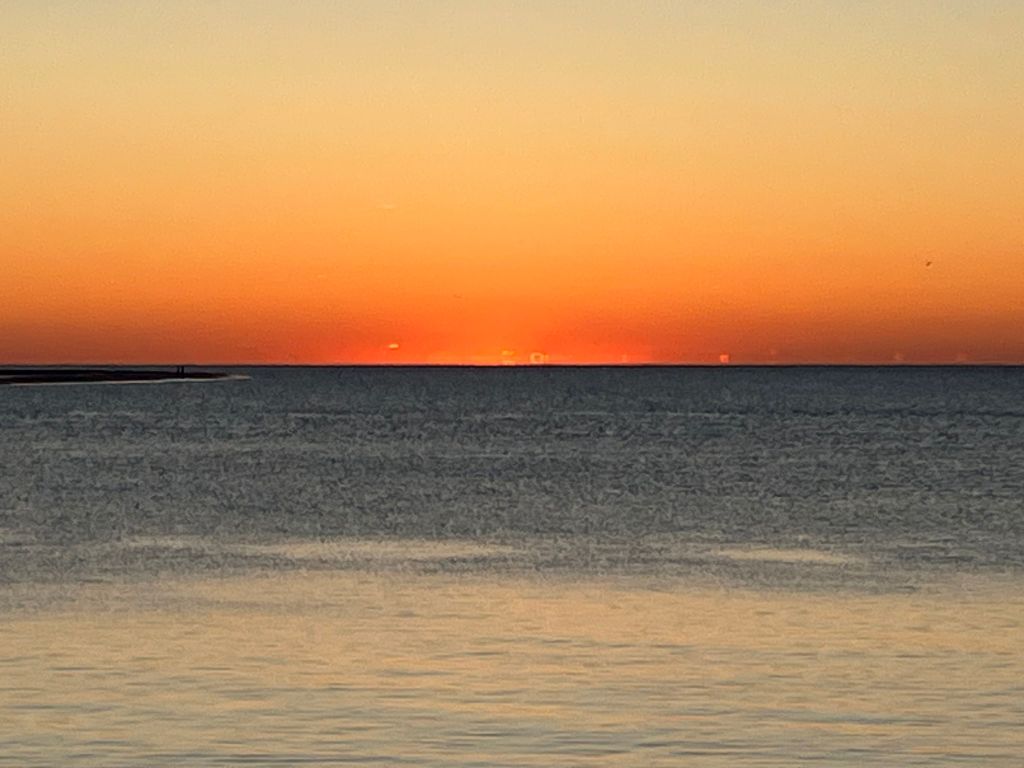 Orange sunset over the water