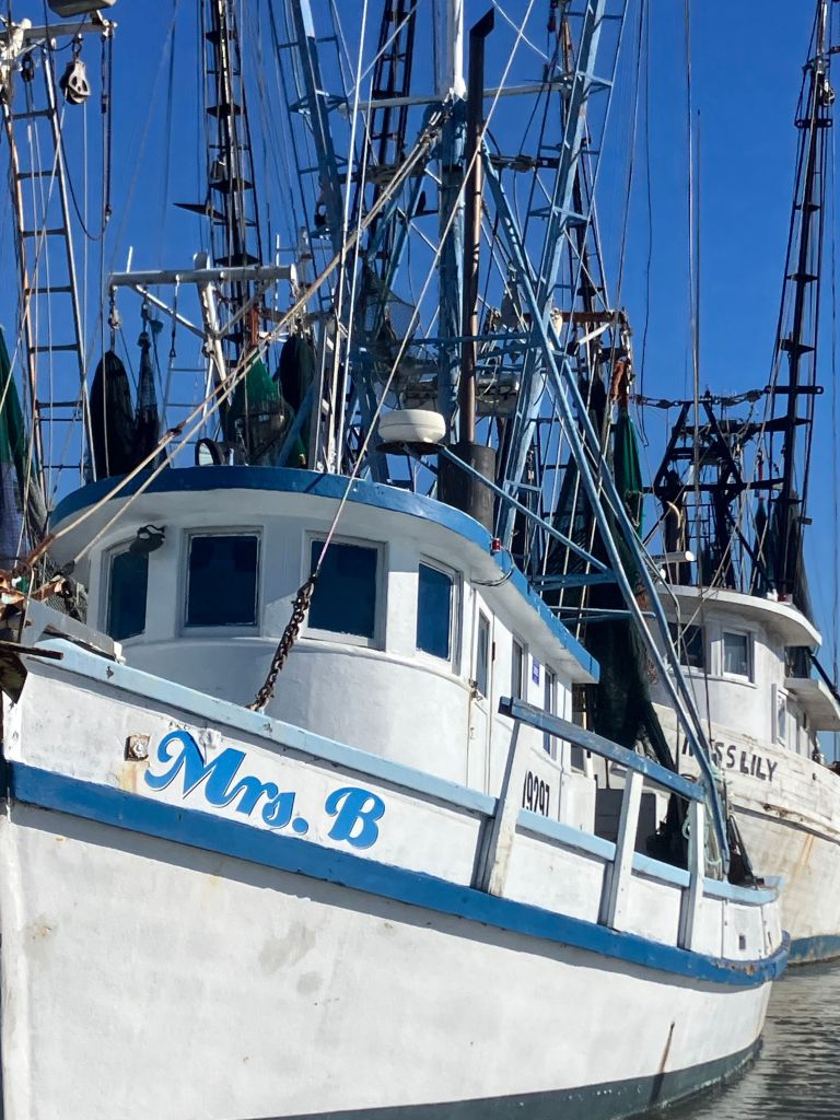 White shrimp boat named Mrs. B at the dock