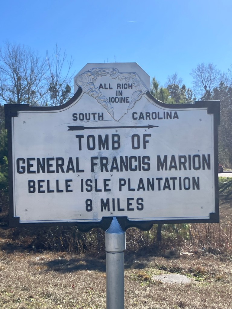 Sign pointing to the Tomb of General Francis Marion at Belle Isle Plantation, 8 miles