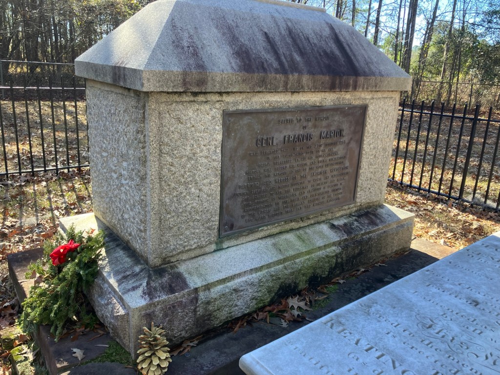 Francis Marion's stone tomb in the family graveyard, with wreaths