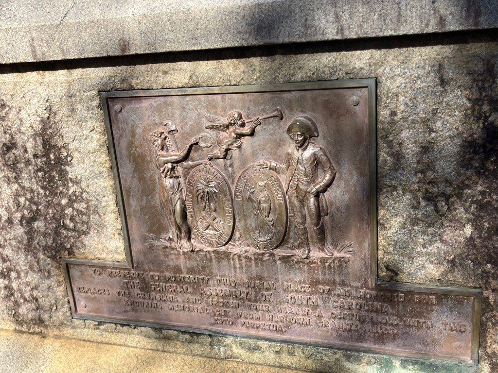 Bronze relief plaque on the side of the Marion tomb