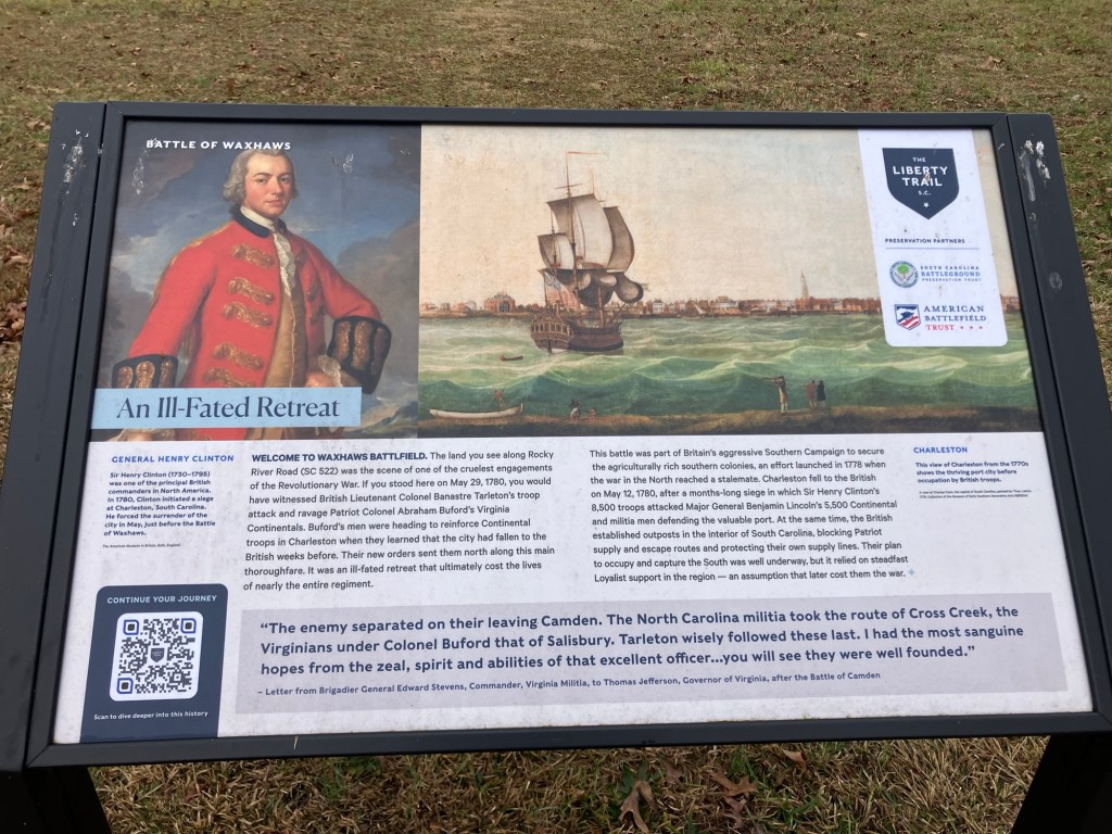 Interpretive panel at the Waxhaws battlefield with a portrait of a British officer and a sailing ship