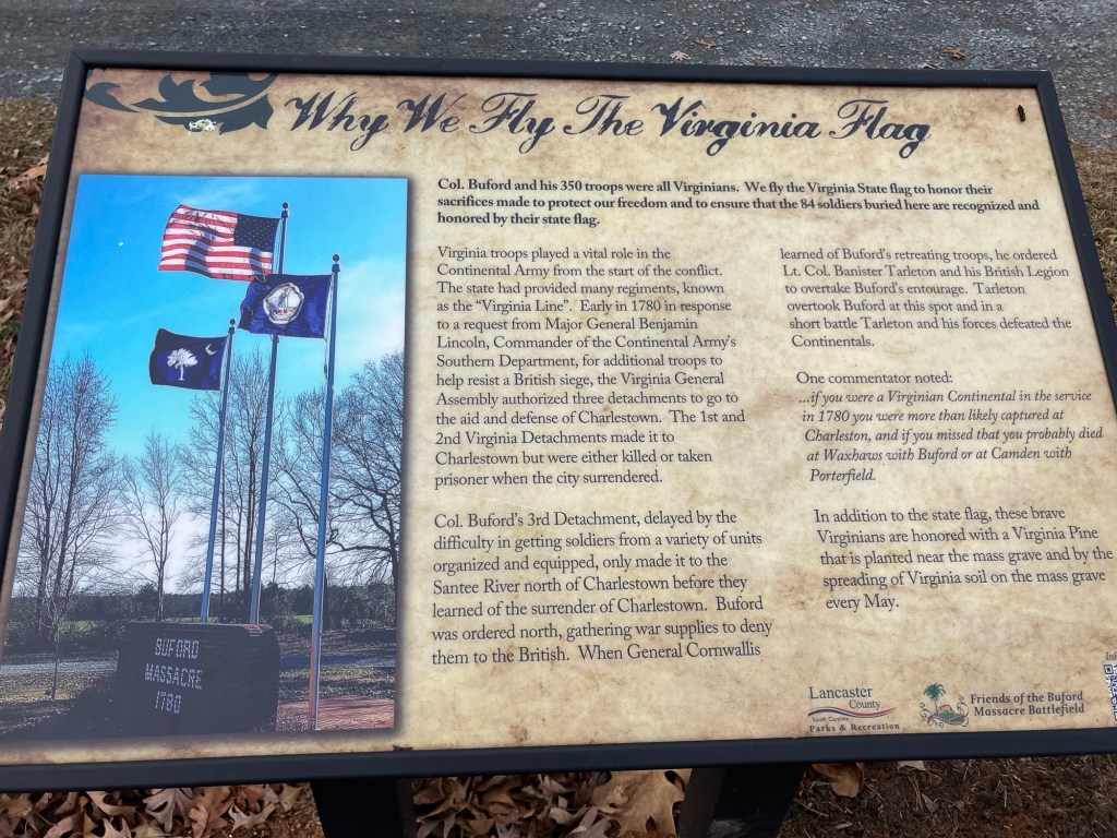 Interpretive panel titled Why We Fly the Virginia Flag at the Waxhaws battlefield
